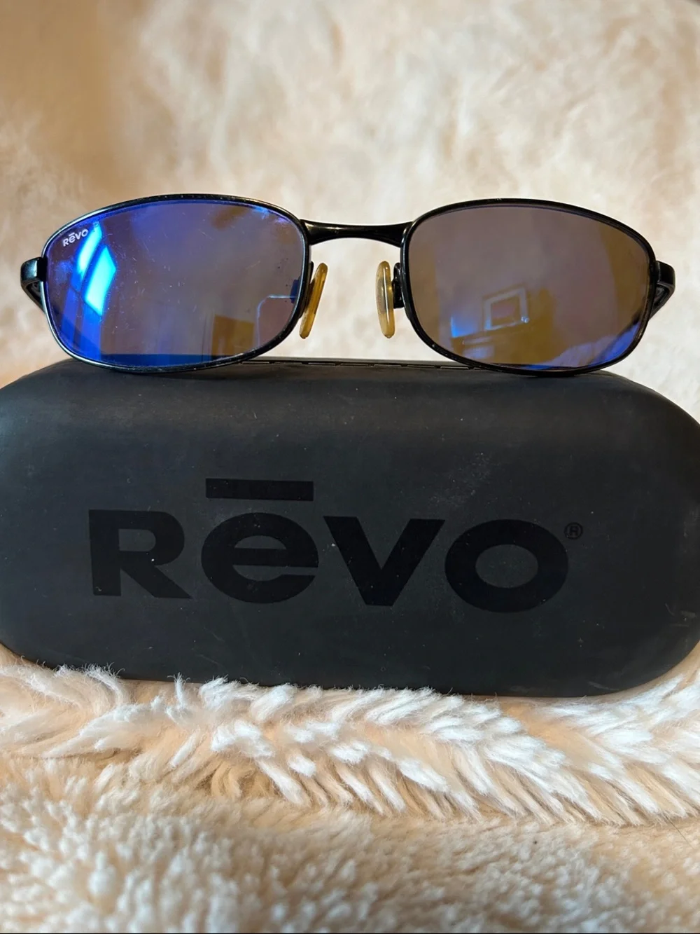 Revo Men’s Black Frame Sunglasses with Blue Mirrored Lenses